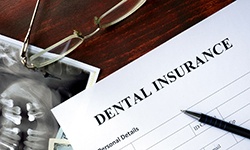 insurance paperwork for the cost of dental implants