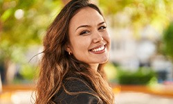 Woman with beautiful smile outside