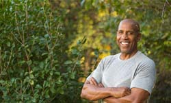 Man with dental implants in San Antonio smiling confidently
