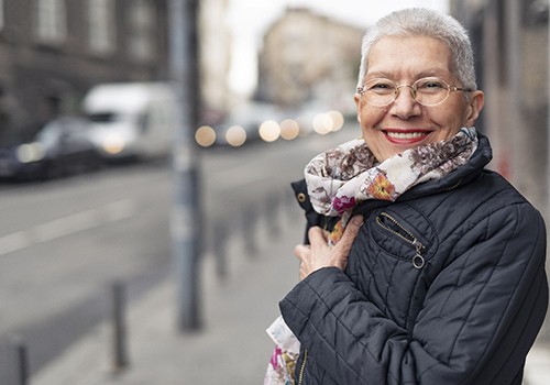 Woman smiling with dental implants in San Antonio