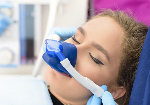 Patient with nitrous oxide dental sedation mask