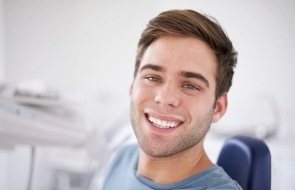 Man in dental chair during preventive dentistry appointment