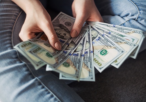 Woman counting cash