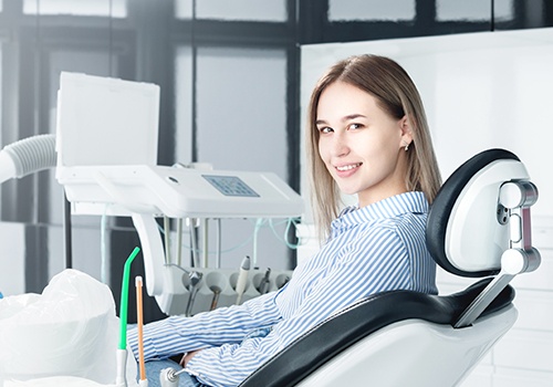 Woman in dental chair after wisdom tooth removal