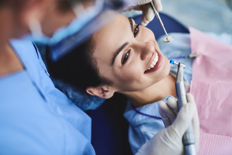 Patient receiving a cleaning from a dentist in San Antonio