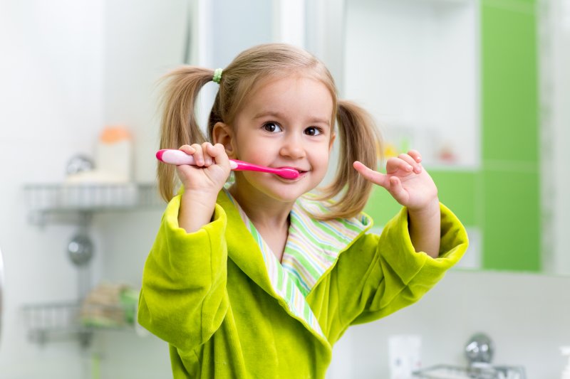 picture of a child brushing their teeth